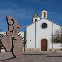 Another naked woman in front of a church?